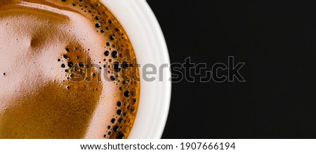 Close up coffee crema and copy space. Royalty-Free Stock Photo #1907666194