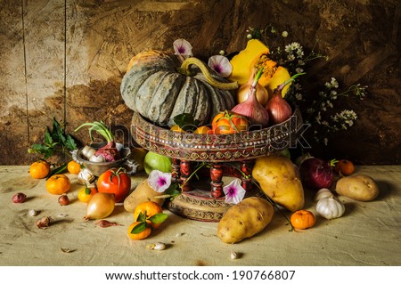  Vegetables, herbs and many fruits, pepper, garlic, onion, tomatoes, Potato, pumpkin, all are ingredients in cooking and placed on the table like beautiful.