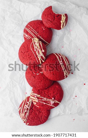 Red velvet cookies on a white plate and milk. Concept: breakfast, romance, valentines day. Top view. Copy space