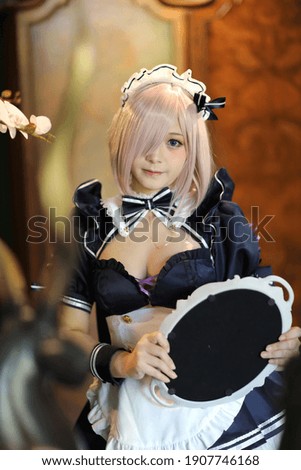 Japan anime cosplay portrait of girl with comic maid costume