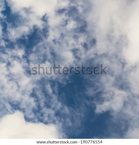 blue sky background with tiny clouds 