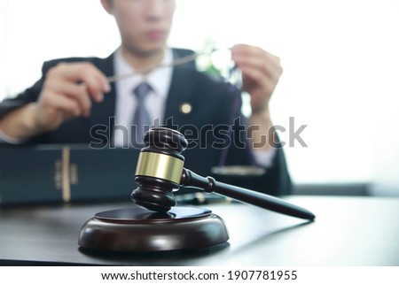 Judge gavel with justice lawyer.Businessman in suit or lawyer. Advice and Legal services Concept.
