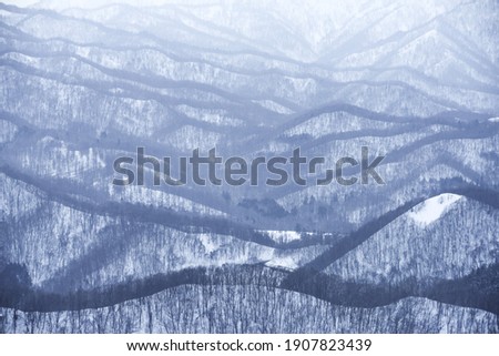 Rolling hills covered in snow in Hokkaido