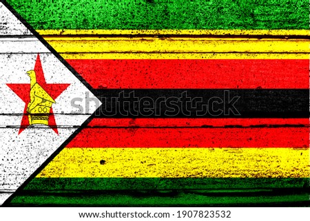 National flag of Zimbabwe, abbreviated with zw; a realistic 3d image of the national symbol from an independent country painted on a wooden wall