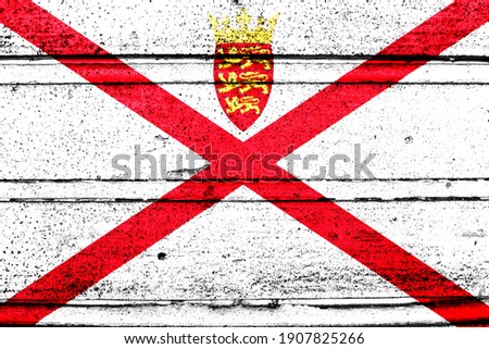 National flag of Jersey, abbreviated with je; a realistic 3d image of the national symbol from an independent country painted on a wooden wall