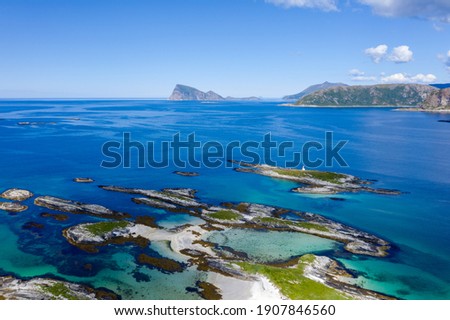 Beautiful top view of the sea shore with white sand and clear turquoise water