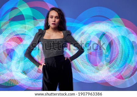 portrait of model on a long exposure with the colourful light source isolated in studio,photos in style picture light. people, model, fashion concept