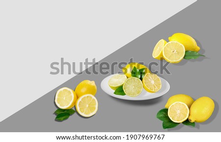 Trending colors of 2021. Yellow illuminating lemons on Ultimate gray table.