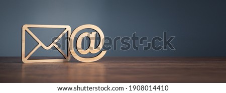 Email symbol at commercial and envelope. internet correspondence.