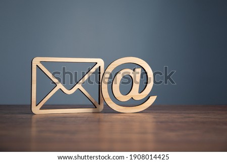 Email symbol at commercial and envelope. internet correspondence.