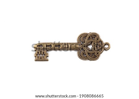 Old antique key on white background Royalty-Free Stock Photo #1908086665