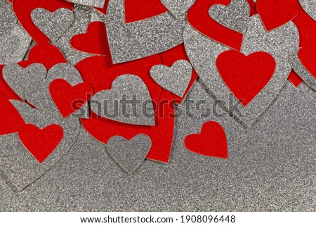 Scattered Red And Silver Hearts On Silver