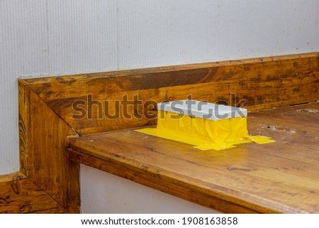 Termite decoy box install at wooden stairs in house for eliminate Royalty-Free Stock Photo #1908163858
