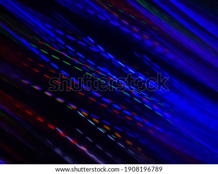 А blu progressive rhythmic light trails on a black background