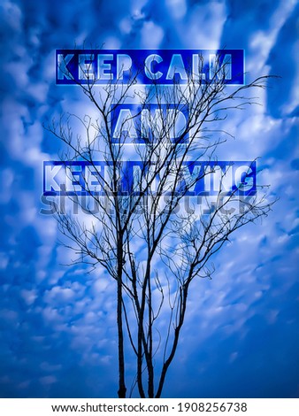 Motivational quote "Keep calm and keep moving" with blue sky and dead tree background. 