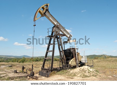 work of oil pump jack on a oil field
