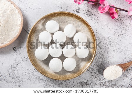 Glue pudding or tangyuan in plate.Chinese Lantern Festival food. Royalty-Free Stock Photo #1908317785