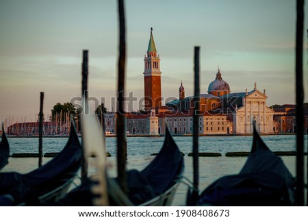 landscape with gondola, san giorgio maggiore island and grand canal in Venice, Italy.