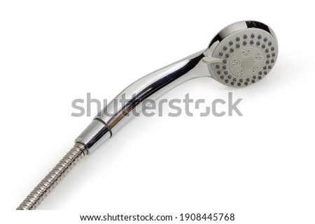 Shower head with turn lever of a spray settings and metal shower hose on a white background, close-up
 Royalty-Free Stock Photo #1908445768