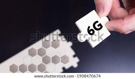 Business, Technology, Internet and network concept. Young businessman shows the word: 6G