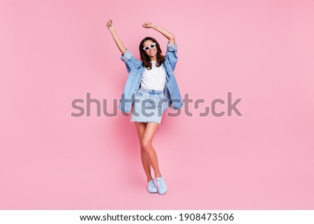Full length photo of young attractive girl happy positive smile fancy gorgeous wear sunglass dance isolated over pink color background