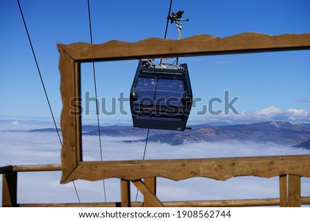 Sarajevo. Bosnia and Herzegovina. february 02 2021. Cable car above Sarajevo. cable car on Mountain Trebevic above Sarajevo. photography of cable car  through wooden Frame