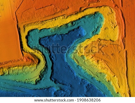 Mine elevation model. GIS product made after proccesing aerial pictures taken from a drone. It shows map of an excavation site with steep rock walls Royalty-Free Stock Photo #1908638206
