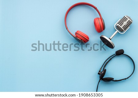 Studio microphone and headphones, top view. Recording podcast and streaming concept
