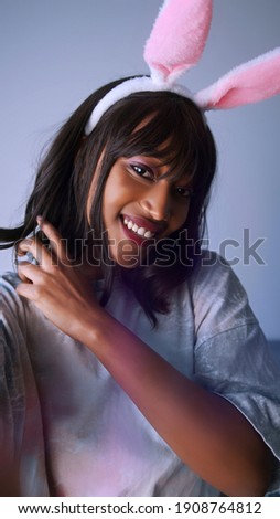 African american woman in bunny costume. High quality photo
