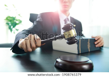 Justice lawyer holding judge gavel, Businessman in suit or lawyer, Advice and Legal services Concept.
 Royalty-Free Stock Photo #1908765379