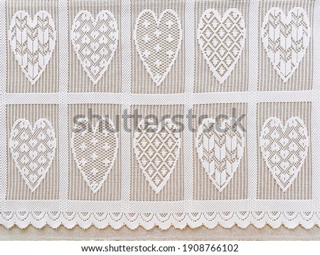 Heart-shaped lace on the generated cloth background