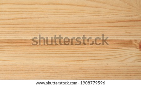 The surface of a fresh, planed pine Board close-up.
