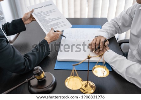 Lawyer discuss the contract and legal document agreement in office. Law and legal concept Royalty-Free Stock Photo #1908831976