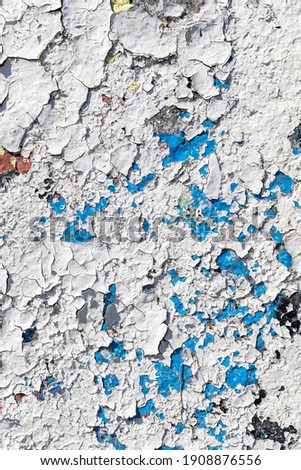 Old white dirty spotty concrete wall. Fashionable backdrop for your projects.