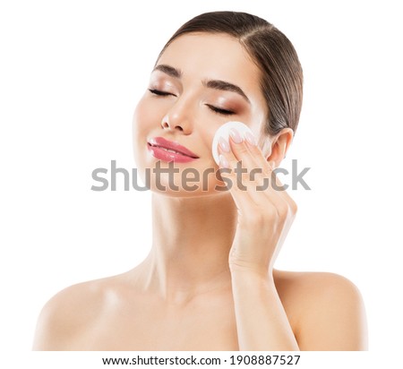 Woman Cleaning Face Skin. Remove Make up with Cotton Pads. Clean Facial Beauty Treatment. Healthy Skin Care Wash. Isolated White Royalty-Free Stock Photo #1908887527