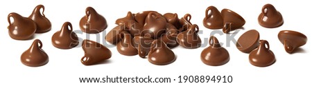 Chocolate drops or chips set isolated on white background. Package design element with clipping path Royalty-Free Stock Photo #1908894910
