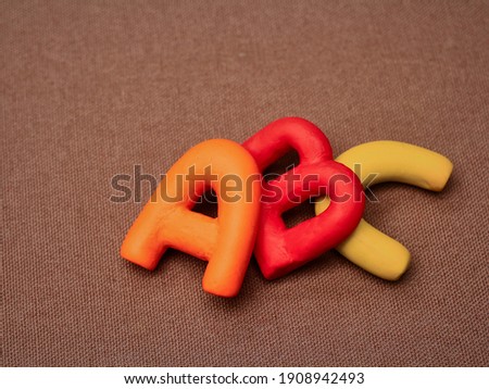 vowels for children, in happy colors in clay and didactic