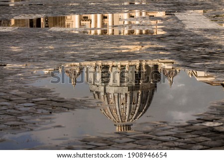 st. Peter basilica reflected in a paddle