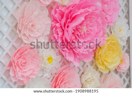 flower is made of corrugated paper. Large Paper Flowers. Peonies. Pink floral background pattern. The flower is made of corrugated paper. Delicate floral decoration. Close the copy space. Decoration