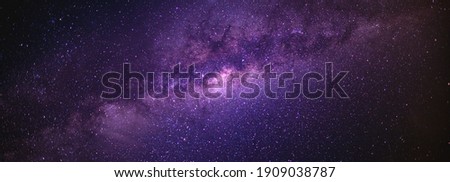 Panorama view universe space shot of milky way galaxy with stars on a night sky background. The Milky Way is the galaxy that contains our Solar System. Royalty-Free Stock Photo #1909038787