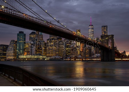 Night view on Brooklyn Bridge and Lower Manhattan with Easter River
