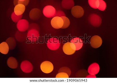 Defocused bokeh lights. Night city street lights bokeh background. The concept of New Year's festive garlands.