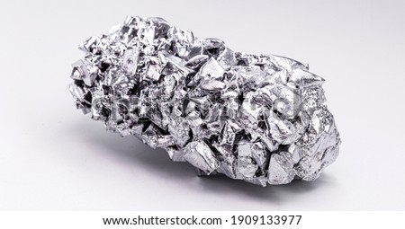 titanium metal alloy, used in the industry, titanium is a transition metal that adds value to metal alloys because it is light and resistant Royalty-Free Stock Photo #1909133977