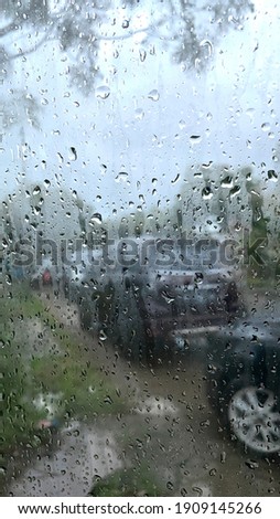 Indonesia - February 3, 2021 : a rain drop view from car window