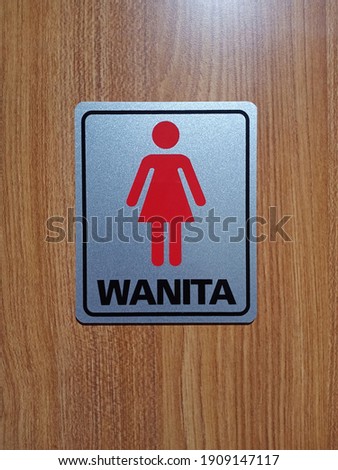 a sign for the women's room