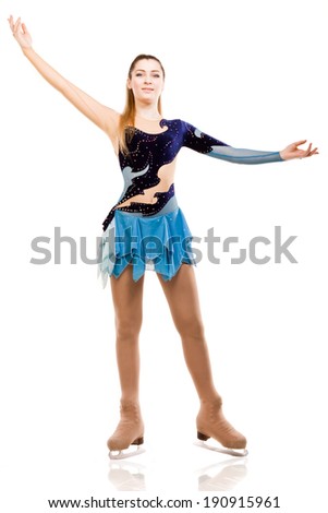 Figure skater posing in skating performance costume