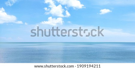 blue sky with blue sea Royalty-Free Stock Photo #1909194211