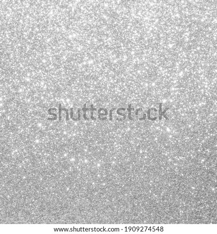 Silver glitter abstract bokeh background Christmas.