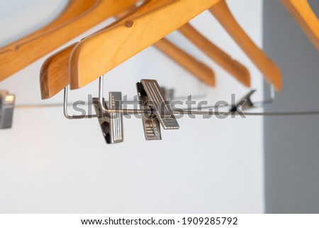 clothespins attached to the hangers