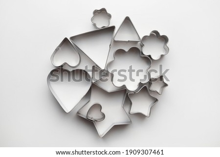 Top view various shape of baking molds isolated on white background